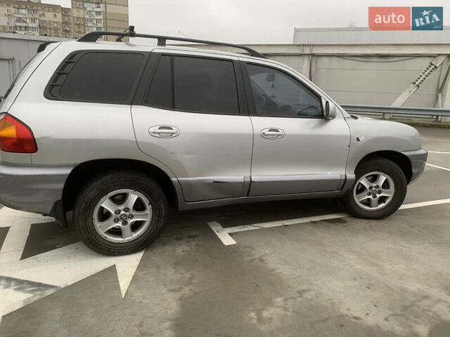 Серый Хендай Санта Фе, объемом двигателя 2.4 л и пробегом 115 тыс. км за 6100 $, фото 4 на Automoto.ua