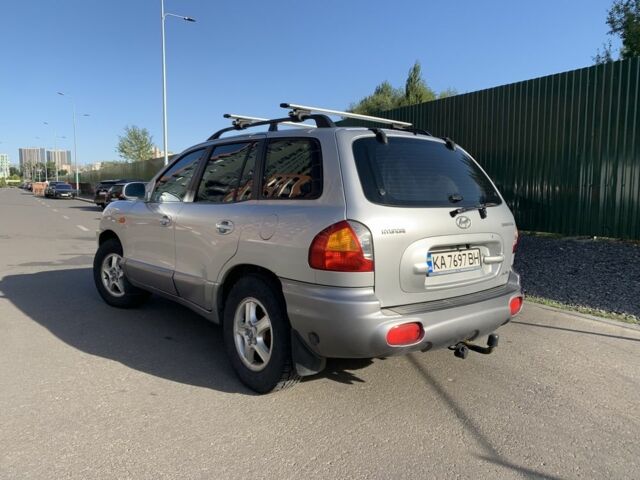 Серый Хендай Санта Фе, объемом двигателя 2.7 л и пробегом 270 тыс. км за 4800 $, фото 2 на Automoto.ua