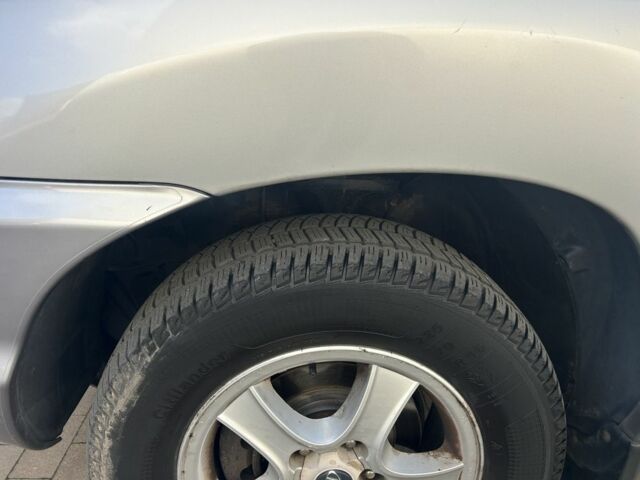 Серый Хендай Санта Фе, объемом двигателя 2 л и пробегом 357 тыс. км за 3700 $, фото 12 на Automoto.ua