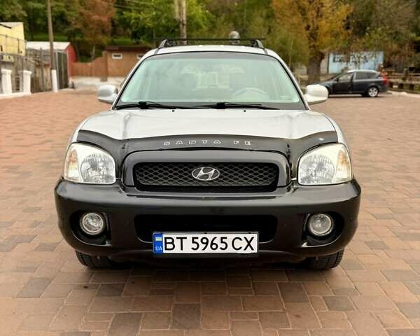 Серый Хендай Санта Фе, объемом двигателя 3.49 л и пробегом 319 тыс. км за 5300 $, фото 1 на Automoto.ua