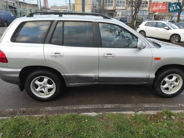 Серый Хендай Санта Фе, объемом двигателя 2 л и пробегом 289 тыс. км за 4900 $, фото 2 на Automoto.ua