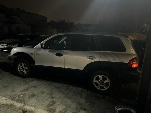 Серый Хендай Санта Фе, объемом двигателя 2 л и пробегом 220 тыс. км за 4200 $, фото 3 на Automoto.ua