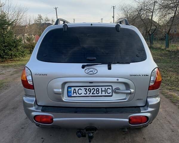 Серый Хендай Санта Фе, объемом двигателя 2 л и пробегом 251 тыс. км за 6500 $, фото 4 на Automoto.ua