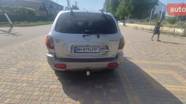 Серый Хендай Санта Фе, объемом двигателя 2 л и пробегом 294 тыс. км за 5700 $, фото 7 на Automoto.ua