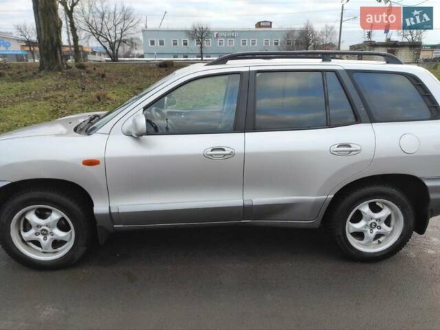 Серый Хендай Санта Фе, объемом двигателя 2 л и пробегом 289 тыс. км за 4900 $, фото 3 на Automoto.ua
