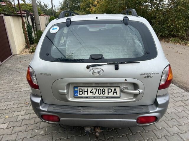Серый Хендай Санта Фе, объемом двигателя 2.4 л и пробегом 260 тыс. км за 4200 $, фото 4 на Automoto.ua
