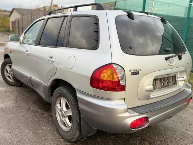 Серый Хендай Санта Фе, объемом двигателя 2 л и пробегом 200 тыс. км за 3200 $, фото 6 на Automoto.ua