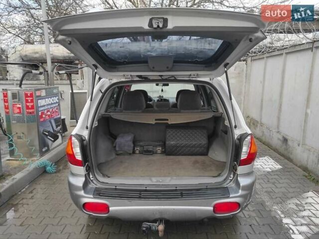 Серый Хендай Санта Фе, объемом двигателя 2 л и пробегом 289 тыс. км за 4900 $, фото 16 на Automoto.ua