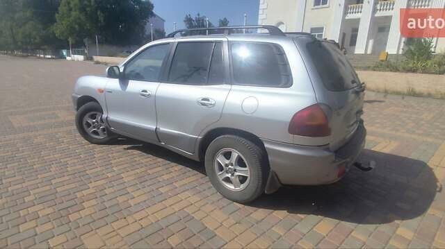 Серый Хендай Санта Фе, объемом двигателя 2 л и пробегом 294 тыс. км за 5700 $, фото 8 на Automoto.ua