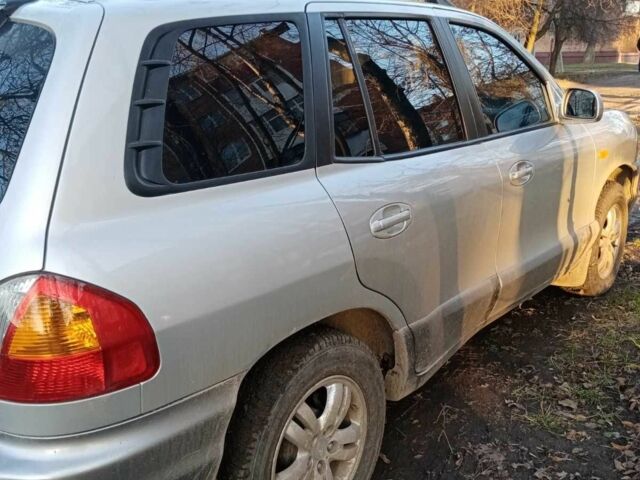 Сірий Хендай Санта Фе, об'ємом двигуна 2.4 л та пробігом 270 тис. км за 6300 $, фото 4 на Automoto.ua