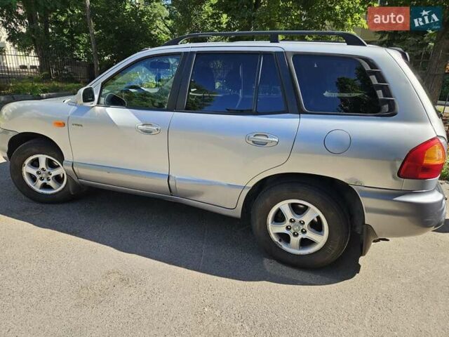 Серый Хендай Санта Фе, объемом двигателя 1.99 л и пробегом 214 тыс. км за 5300 $, фото 9 на Automoto.ua