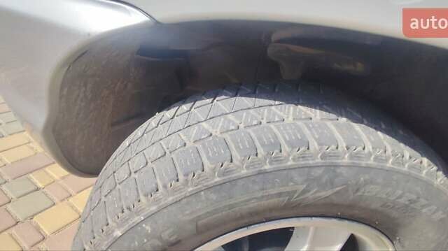 Серый Хендай Санта Фе, объемом двигателя 2 л и пробегом 294 тыс. км за 5700 $, фото 15 на Automoto.ua