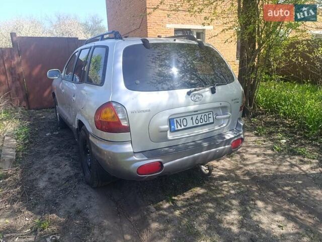 Серый Хендай Санта Фе, объемом двигателя 2 л и пробегом 304 тыс. км за 2800 $, фото 4 на Automoto.ua