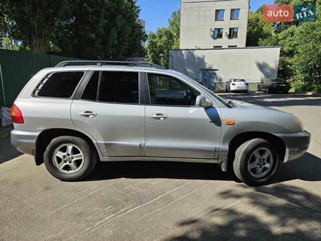 Серый Хендай Санта Фе, объемом двигателя 1.99 л и пробегом 214 тыс. км за 5300 $, фото 7 на Automoto.ua