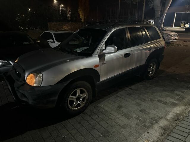 Серый Хендай Санта Фе, объемом двигателя 2 л и пробегом 220 тыс. км за 4200 $, фото 5 на Automoto.ua