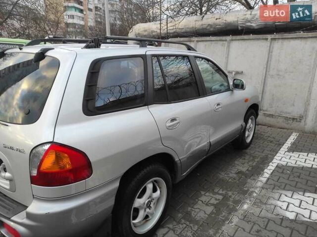 Серый Хендай Санта Фе, объемом двигателя 2 л и пробегом 289 тыс. км за 4900 $, фото 5 на Automoto.ua