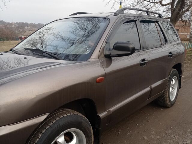 Серый Хендай Санта Фе, объемом двигателя 2.4 л и пробегом 320 тыс. км за 4500 $, фото 2 на Automoto.ua