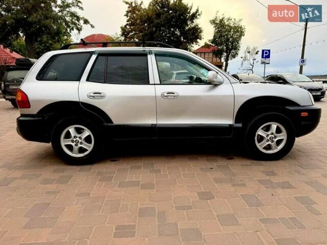 Серый Хендай Санта Фе, объемом двигателя 3.49 л и пробегом 319 тыс. км за 5300 $, фото 7 на Automoto.ua