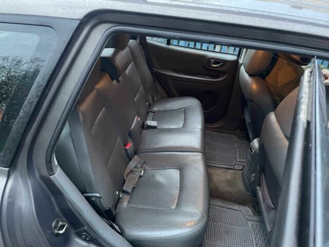 Серый Хендай Санта Фе, объемом двигателя 2 л и пробегом 280 тыс. км за 3800 $, фото 4 на Automoto.ua