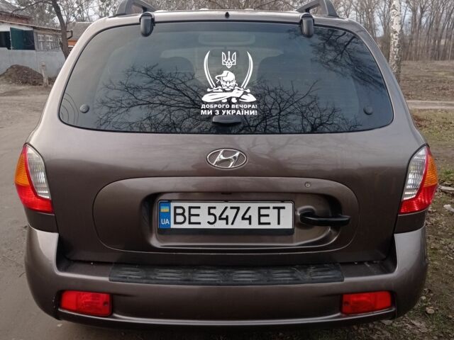 Серый Хендай Санта Фе, объемом двигателя 2.4 л и пробегом 320 тыс. км за 4500 $, фото 4 на Automoto.ua