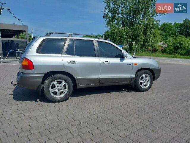Серый Хендай Санта Фе, объемом двигателя 2 л и пробегом 290 тыс. км за 5950 $, фото 2 на Automoto.ua