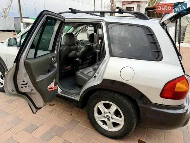 Серый Хендай Санта Фе, объемом двигателя 3.49 л и пробегом 319 тыс. км за 5300 $, фото 22 на Automoto.ua