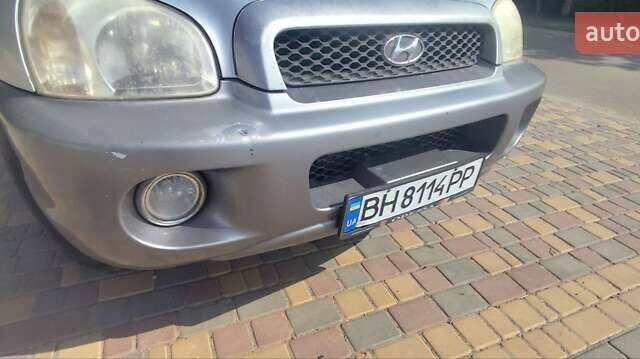 Серый Хендай Санта Фе, объемом двигателя 2 л и пробегом 294 тыс. км за 5700 $, фото 6 на Automoto.ua