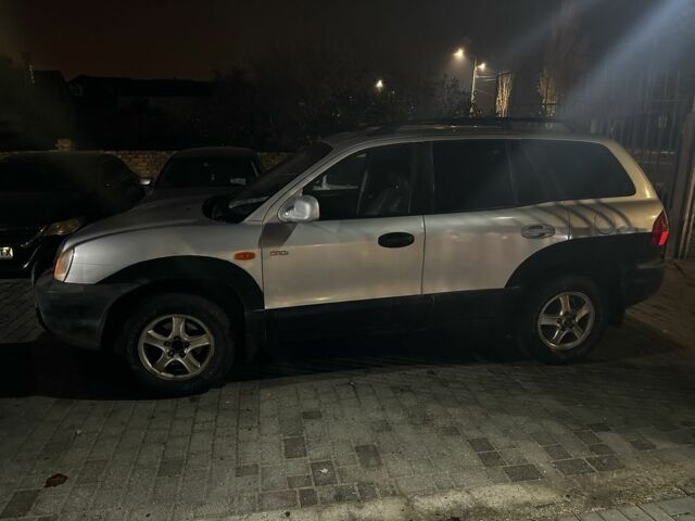 Серый Хендай Санта Фе, объемом двигателя 2 л и пробегом 220 тыс. км за 4200 $, фото 2 на Automoto.ua