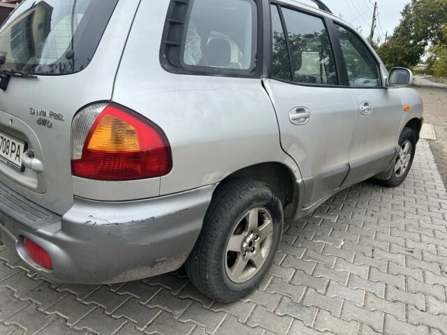 Серый Хендай Санта Фе, объемом двигателя 2.4 л и пробегом 260 тыс. км за 4200 $, фото 5 на Automoto.ua