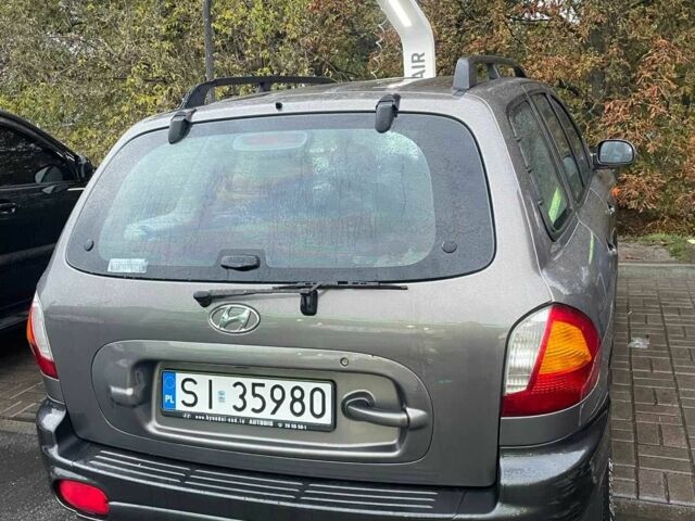 Серый Хендай Санта Фе, объемом двигателя 2 л и пробегом 280 тыс. км за 3800 $, фото 2 на Automoto.ua