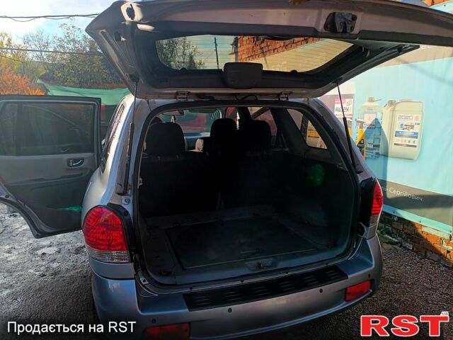 Сірий Хендай Санта Фе, об'ємом двигуна 2.4 л та пробігом 234 тис. км за 5700 $, фото 2 на Automoto.ua