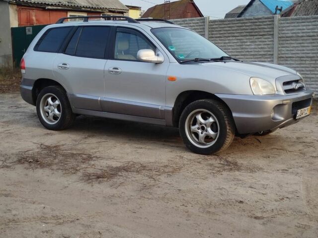 Серый Хендай Санта Фе, объемом двигателя 2.4 л и пробегом 260 тыс. км за 3300 $, фото 1 на Automoto.ua