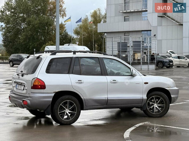 Серый Хендай Санта Фе, объемом двигателя 1.99 л и пробегом 299 тыс. км за 3999 $, фото 9 на Automoto.ua