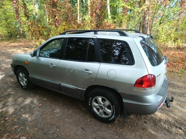 Серый Хендай Санта Фе, объемом двигателя 2 л и пробегом 290 тыс. км за 2650 $, фото 4 на Automoto.ua