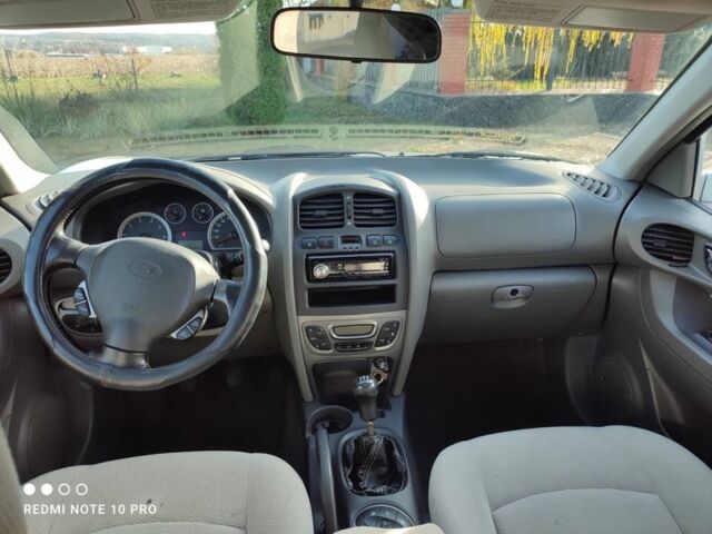 Сірий Хендай Санта Фе, об'ємом двигуна 2 л та пробігом 235 тис. км за 4099 $, фото 4 на Automoto.ua