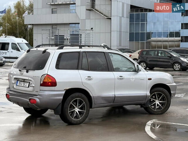 Серый Хендай Санта Фе, объемом двигателя 1.99 л и пробегом 299 тыс. км за 3999 $, фото 10 на Automoto.ua