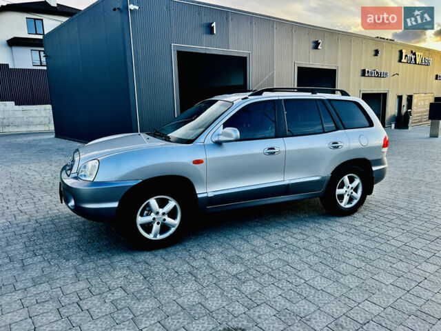Серый Хендай Санта Фе, объемом двигателя 2.4 л и пробегом 262 тыс. км за 6900 $, фото 5 на Automoto.ua