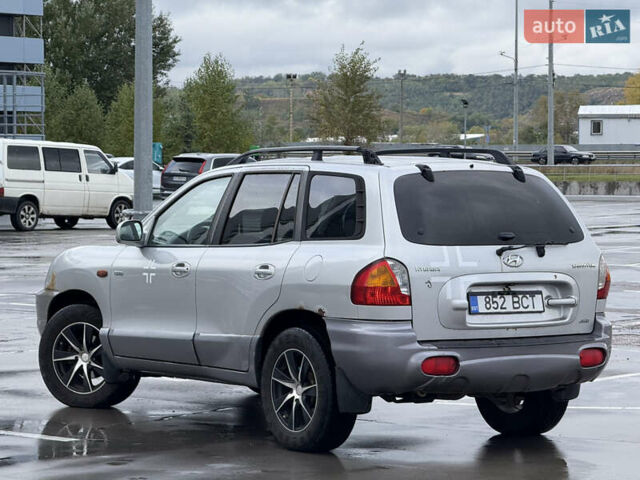 Серый Хендай Санта Фе, объемом двигателя 1.99 л и пробегом 299 тыс. км за 3999 $, фото 7 на Automoto.ua