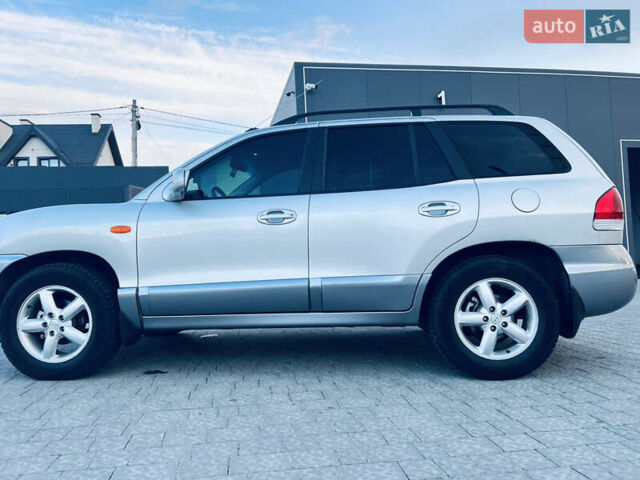 Серый Хендай Санта Фе, объемом двигателя 2.4 л и пробегом 262 тыс. км за 6900 $, фото 2 на Automoto.ua