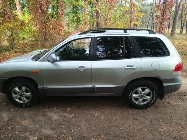 Серый Хендай Санта Фе, объемом двигателя 2 л и пробегом 290 тыс. км за 2650 $, фото 3 на Automoto.ua