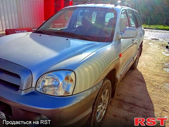 Серый Хендай Санта Фе, объемом двигателя 2 л и пробегом 252 тыс. км за 6000 $, фото 3 на Automoto.ua