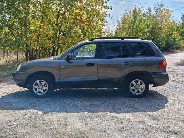 Серый Хендай Санта Фе, объемом двигателя 2 л и пробегом 263 тыс. км за 3600 $, фото 1 на Automoto.ua