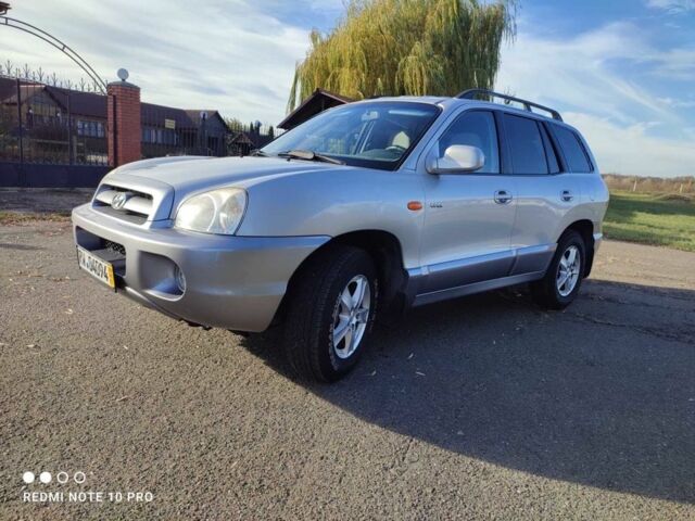 Сірий Хендай Санта Фе, об'ємом двигуна 2 л та пробігом 235 тис. км за 4099 $, фото 3 на Automoto.ua