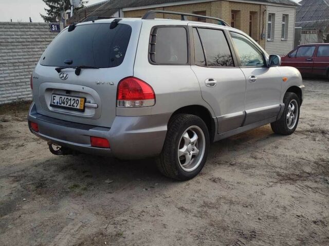 Серый Хендай Санта Фе, объемом двигателя 2.4 л и пробегом 260 тыс. км за 3300 $, фото 3 на Automoto.ua