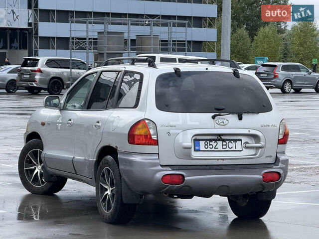 Серый Хендай Санта Фе, объемом двигателя 1.99 л и пробегом 299 тыс. км за 3999 $, фото 8 на Automoto.ua