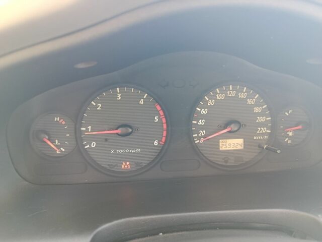 Серый Хендай Санта Фе, объемом двигателя 2 л и пробегом 263 тыс. км за 3600 $, фото 5 на Automoto.ua