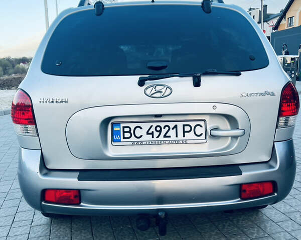 Серый Хендай Санта Фе, объемом двигателя 2.4 л и пробегом 262 тыс. км за 6900 $, фото 55 на Automoto.ua