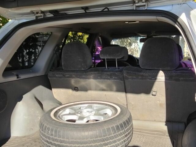 Серый Хендай Санта Фе, объемом двигателя 2 л и пробегом 231 тыс. км за 4700 $, фото 4 на Automoto.ua