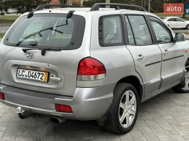 Серый Хендай Санта Фе, объемом двигателя 2.4 л и пробегом 220 тыс. км за 6750 $, фото 1 на Automoto.ua