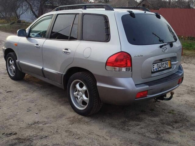 Серый Хендай Санта Фе, объемом двигателя 2.4 л и пробегом 260 тыс. км за 3300 $, фото 2 на Automoto.ua